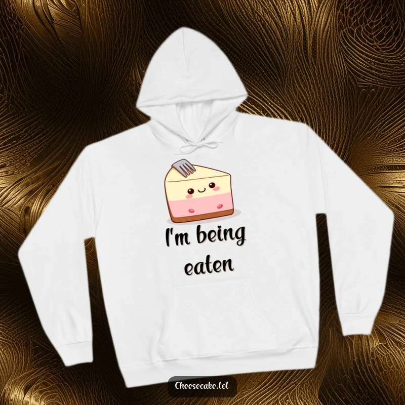 Funny cheesecake hoodie showing a delighted slice with a fork stuck in it, perfect for cozy, humorous moments.