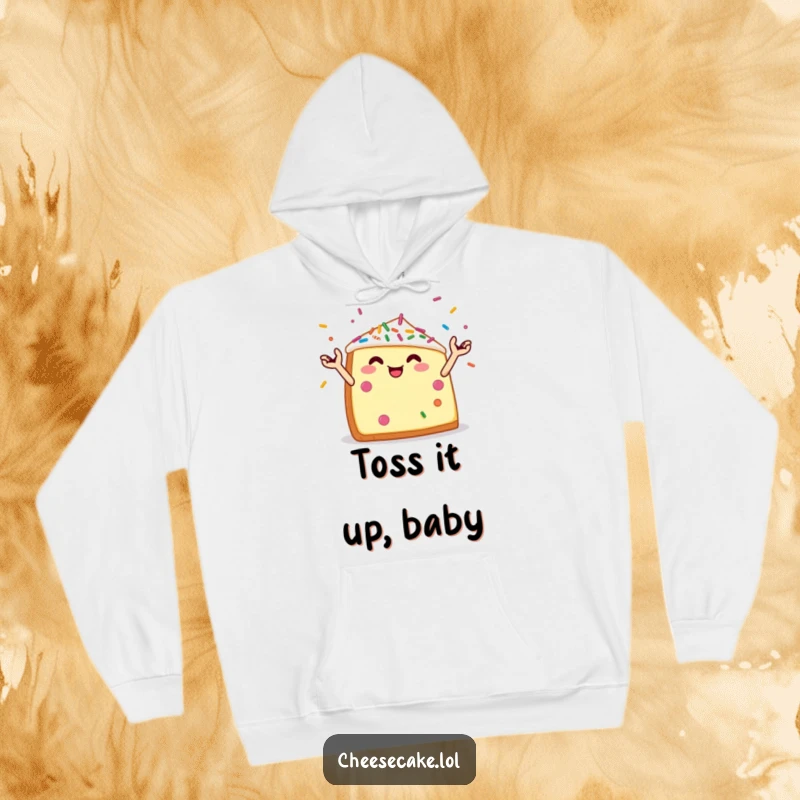 Funny hoodie featuring a cheerful cheesecake wedge with tiny arms juggling colorful sprinkles, a festive dessert celebration.