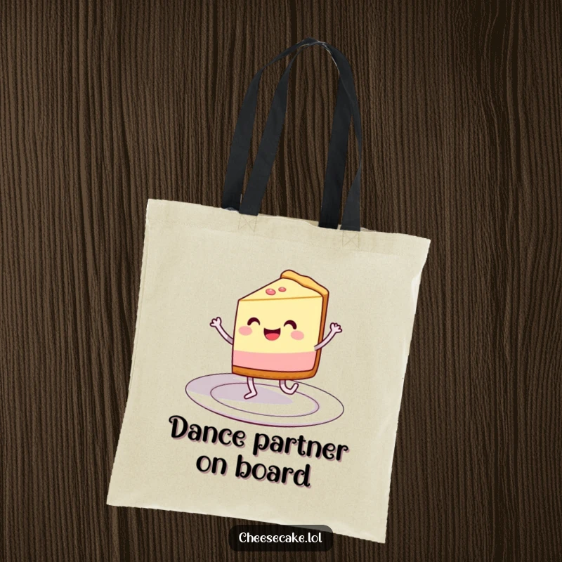 Funny tote bag with a grinning cheesecake slice dancing on a plate, perfect for carrying essentials with flair.